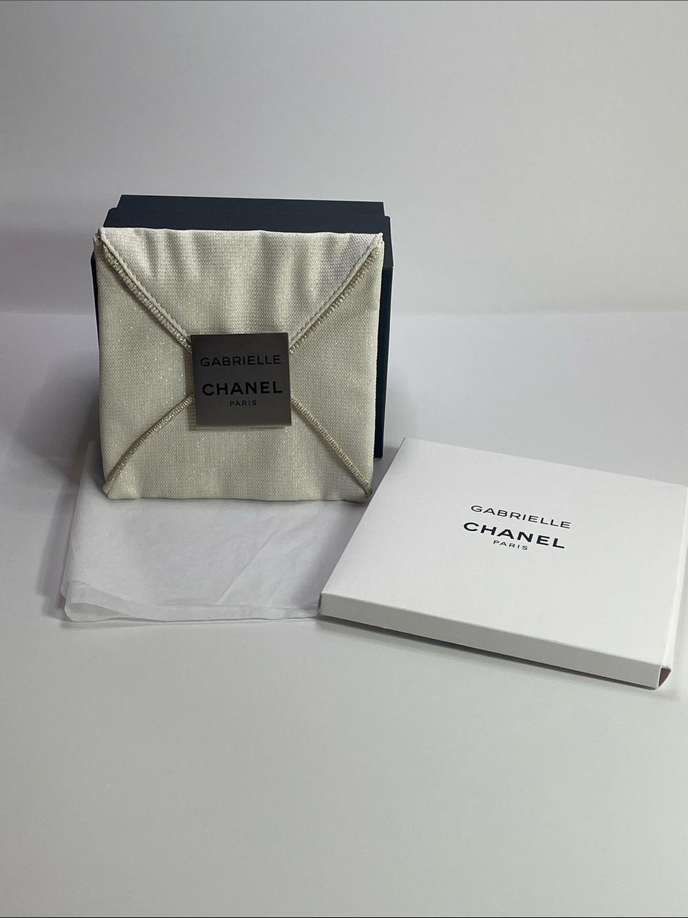 CHANEL Cream Gabrielle Fabric Pouch with Metal Plaque